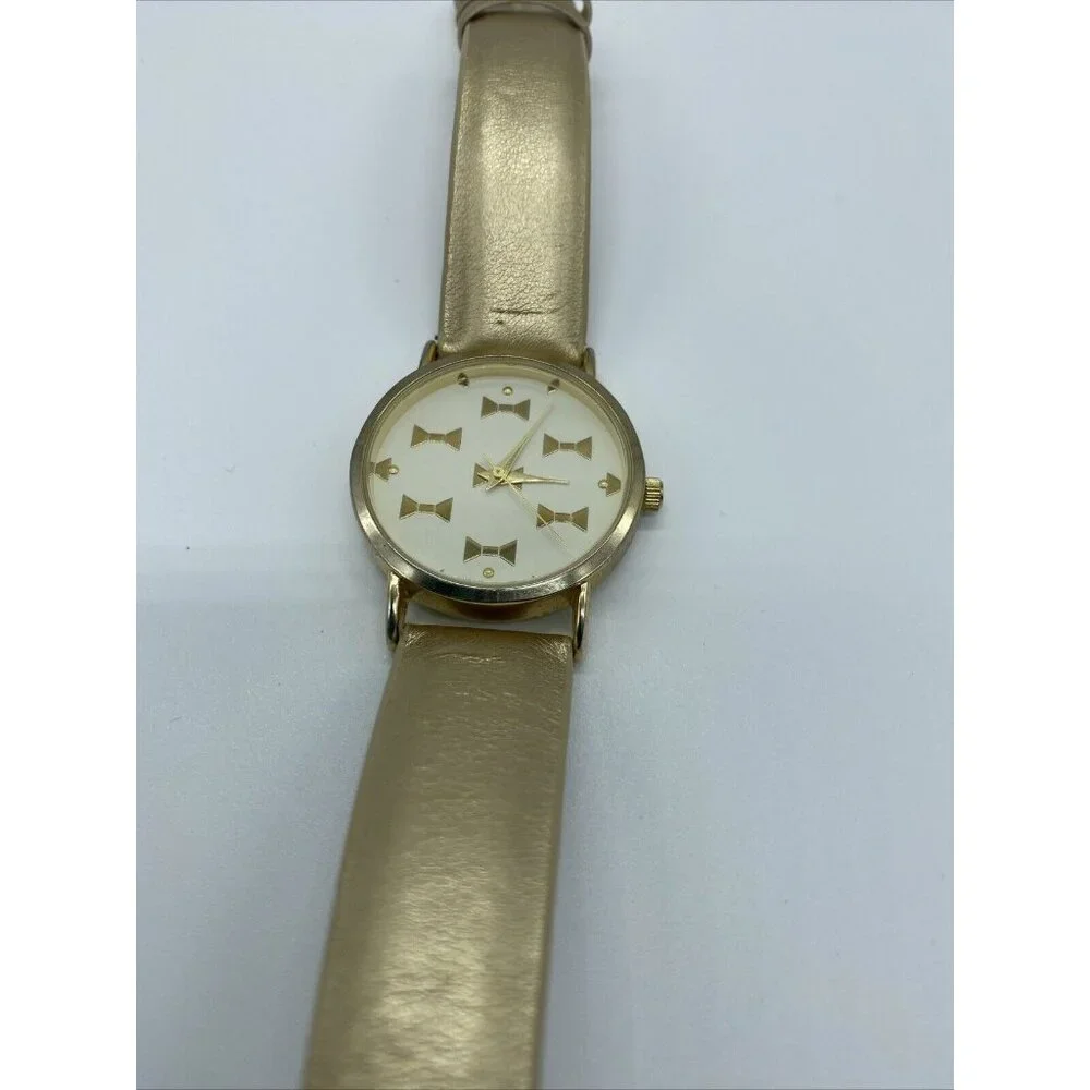 Geneva Platinum No.9880 Women's Gold Band White Face Watch w/ Gold Bowties